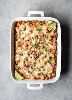 a casserole dish filled with mexican food