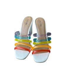 Open Toe Silhouette Rainbow Colors Strap Preloved Excellent Condition No Major Stains Or Flaws Box Not Included Heel Is 4 Inches Bundle For A Better Deal Xoxo Questions? Leave A Comment Below! Rainbow Open Toe Platform Heels, Rainbow Heels With Round Toe For Summer, Spring Rainbow Open Toe Heels, Rainbow Open Toe Synthetic Heels, Purple Wedge Sandals For Summer Beach, Purple Wedge Sandals For Beach In Summer, Purple Summer Wedge Sandals For Beach, Trendy Rainbow Synthetic Sandals, Summer Multicolor Wedge Heels