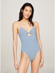 Tommy Hilfiger women's swimwear. This retro-check print one-piece swimsuit features a self-tie straps, a center cut-out, and a low-cut back.  Material: 72% Recycled Nylon ,  Polyamide, 17% Polyesther Pes. Tommy Hilfiger Swimwear For Spring Beachwear, Tommy Hilfiger Beachwear For Spring, Tommy Hilfiger Spring Beachwear, Tommy Hilfiger Beachwear, Gingham Swimwear With Adjustable Straps For Poolside, Poolside Gingham Swimwear With Adjustable Straps, Tommy Hilfiger Swimwear For Poolside Summer, Tommy Hilfiger Beachwear Swimwear, Tommy Hilfiger Beachwear Swimwear For Beach Season