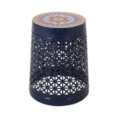 an intricately decorated blue metal stool