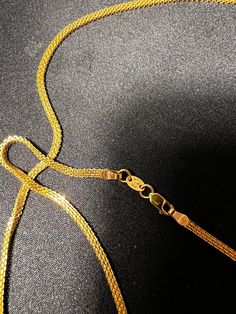 Embrace the allure of pure sophistication with our exquisite 22k gold chain, a versatile piece that transcends the ordinary. Designed for both him and her, this 22-inch masterpiece radiates with a warm glow, adding an understated luxury to any ensemble. Why Choose Our 22K Gold Chain? This chain isn't just an accessory; it's an investment. With its timeless appeal and solid gold composition, it promises to be a staple in your jewelry collection, withstanding the test of time and trends. 22k Gold Chain Necklace For Wedding, Gold Snake Chain Necklace For Wedding, Luxury 22k Gold Chain Necklace Gift, 22k Gold Chain Jewelry, Elegant 22k Gold Chain Jewelry, 22k Yellow Gold Link Chain Necklace, 22k Yellow Gold Chain Necklace For Wedding, 14k Gold Wedding Chain Necklace, Gold 22k Box Chain Necklace