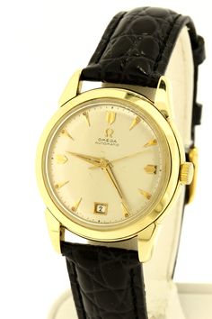 This fabulous 1950s vintage Omega wrist watch is a 18K Yellow timepiece. Its a Automatic date dial that is a Cal. 353 with Reference number 2627. The case of the watch measures 36.73mm wide 42mm long and sits 11.07mm tall. The gap between the lugs is 18mm wide.f you would like a different strap, feel free to convo us and we can discuss options. Makes a wonderful birthday or graduation gift! 2426KILSPK --Please reference our policy for more details-- For International orders, please provide a pho Classic Self-winding Watch With Round Dial, Classic Self-winding Watches, Retro Gold Watch With Polished Finish, Retro Gold Watches With Polished Finish, Gold Retro Watch With Polished Finish, Timeless Self-winding Watch With Round Dial, Retro Yellow Gold Watches For Formal Occasions, Retro Yellow Gold Formal Watch, Timeless Yellow Gold Self-winding Watches