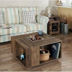 a wooden coffee table sitting on top of a hard wood floor next to a couch