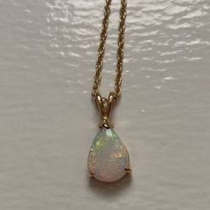 Vintage 14k & Opal Necklace From The 1980s. Genuine Teardrop Opal Set In Stamped 14k Solid Gold. Included 14k Solid Gold Chain Is 18 Inches & Weighs 2g. Stone Measures Approx 10x10mm. Total Length Of The Stone And Bale Is 1/2 Inch. No Flaws/Damage. Beautiful Necklace, Makes A Big Impact. Solid Gold Chains, 14k Gold Necklace, The 1980s, Beautiful Necklace, Opal Necklace, Shop Necklaces, Gold Chain, Beautiful Necklaces, Gold Chains