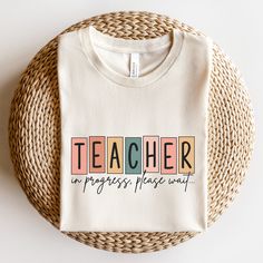 The perfect gift for a student teacher, future teacher or teacher in training! Find future teacher gifts, sweatshirts and t-shirts for your favorite student teachers here: https://www.etsy.com/shop/JaxGraphicTees?ref=seller-platform-mcnav&search_query=future+teacher All of our adult t-shirts are Bella + Canvas 3001 Unisex shirts. They are a super soft fabric that will quickly become a go to in your wardrobe. Its lightweight and flexible material is perfect for casual wear or any activity. Sizing Teacher In Progress Shirt, Student Teacher Shirt, Teacher In Training Shirt, Future Teacher Shirt, Teacher In Progress, Teacher In Training, Future Teacher Gifts, Teacher Canvas, Teacher Vibes