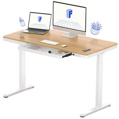 two computer screens sitting on top of a wooden desk