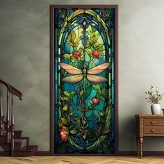 a stained glass door with a dragon on it