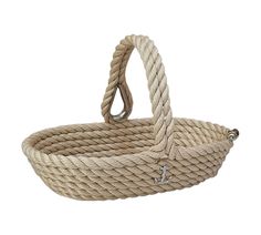 a white rope basket hanging from the ceiling with an anchor on it's side