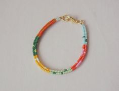 Elegant handmade bracelet made of colorful beads in striking pastel tones. Whether you're dressing up for a special occasion or adding a sophisticated touch to your everyday look, this bracelet is an ideal match. Delicate craftsmanship and vibrant colors make it a versatile piece suitable for a variety of occasions, from casual gatherings to formal events. 🎁 It's also an ideal gift suggestion. Whether it's a birthday, a holiday, or just an expression of gratitude, this bracelet is a meaningful Adjustable Pastel Beaded Bracelet, Multicolor Bohemian Bracelet For Spring, Colorful Bohemian Beaded Bracelets For Spring, Handmade Pastel Bohemian Bracelets, Handmade Adjustable Pastel Beaded Bracelets, Bohemian Beaded Bracelets With Tiny Beads For Spring, Bohemian Friendship Bracelets With Colorful Beads For Spring, Handmade Multicolor Bracelets For Spring, Handmade Bohemian Beaded Bracelets In Pastel