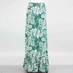 PRODUCT DETAILS Green leaf print Elastic waist Flared bottom Maxi skirt Casual to semi-formal style Material: 100% polyester PRODUCT CARE Wash before wear Machine wash with cold water Gentle cycle Do not bleach Tumble dry low Green Printed Skirt For Vacation, Printed Green Skirt For Vacation, Green High Waist Maxi Skirt For Vacation, Green Floral Print Long Skirt, Green Floral Print Flowy Skirt, Tropical Flowy Skirt Bottoms With Floral Print, Maxi Skirt Casual, Green Sari, Sugar Skull Cat