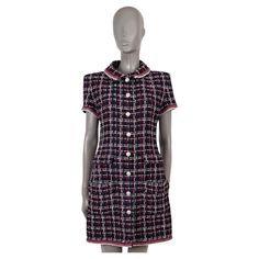 100% authentic Chanel short sleeve tweed shirt dress in navy blue, red and white viscose (50%), linen (22%), polyamide (17%) and cotton (11%). Features braided trims and four flap pockets at the waist. Opens with rhinestone encrusted buttons on the front and is lined in silk (100%). Has been worn and is in excellent condition - please note the dress has been made a bit longer by Chanel. 2020 Spring/Summer Measurements Model 20S P64002 V48688 Tag Size 40 Size M Shoulder Width 41cm (16in) Bust From 102cm (39.8in) Waist From 82cm (32in) Hips From 104cm (40.6in) Length 87cm (33.9in) Side Seam Length 66cm (25.7in) Sleeve Length 16cm (6.2in) All our listings include only the listed item unless otherwise specified in the description above. Chanel 1920s Dress, Chanel 1960 Fashion, Vintage Chanel Mini Dress, Chanel Striped Top, Chanel Shorts, Vintage Chanel Dress Wool, Tweed Shirt, Chanel 2020, Navy Chanel