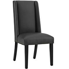 a black leather dining chair with studded trimmings on the legs and back