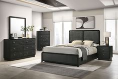 a bedroom scene with focus on the bed and dresser