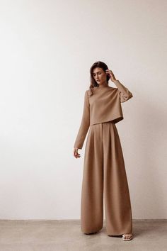 Gender: Woman Season:Spring Style: OL Type: Round neck Pullover / Wide leg Elasticity: None Thickness: Normal Fabric: Woven Fabric composition: polyester Size Bust Waist Hips Sleeve Top Length Pants Length S 102cm 66cm 104cm 61.5cm 55cm 107cm M 106cm 70cm 108cm 62cm 56cm 108cm L 110cm 74cm 112cm 62.5cm 57cm 109cm Khaki Blouse, Womens Matching Sets, Beige Pants, Brown Suits, Beige Top, Long Trousers, Brown Pants, Pantalon Large, Moda Vintage