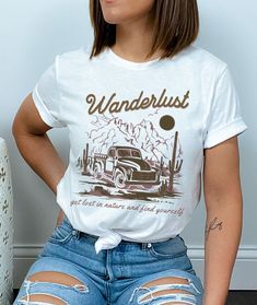 "This is a unisex sized comfort colors t-shirt with a cute retro wanderlust desert theme! It is a high quality and durable material - famous for it's \"worn-in\" look and vintage inspired muted color options. This t shirt is a great gift for the cowgirls in your life! SIZE UP 1-2 SIZES FOR A TRENDY, LOOSE FIT PLEASE NOTE This is a standard unisex size Comfort Colors T-shirt. For an oversized tee, please size up. If you're looking for an oversized t-shirt dress look, we recommend sizing up 2 size Summer Adventure T-shirt With Text Print, White Summer T-shirt For Adventure, Casual Pre-shrunk Shirt For Adventure, Vintage Summer Outdoor T-shirt, Pre-shrunk Summer Adventure Shirt, Pre-shrunk Summer Shirt For Adventure, Relaxed Fit T-shirt For Summer Adventure, White Casual Shirt For Adventure, Summer Adventure Graphic Print T-shirt