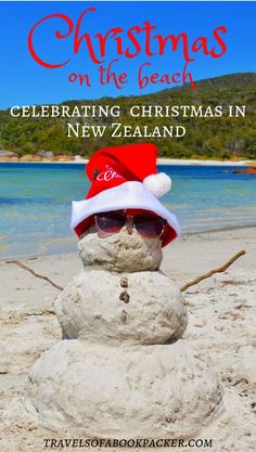 a snowman wearing a santa hat and sunglasses on the beach with text overlay christmas on the beach celebrating christmas in new zealand