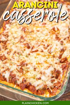 a casserole dish with cheese and meat in it on a wooden counter top