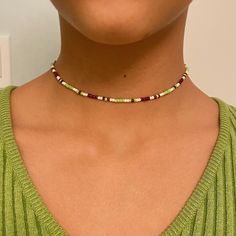 - Super cute beaded choker perfect for styling with your green and brown fits <3 - Handmade item  - Metal material: Nickel Free Zinc Alloy - Made with 0.8 mm elastic cord  - 13 inches + 1 inch chain extension - I can also make it longer or shorter! - Shipping is untracked - Message me if you have any questions <3 Casual Green Choker Jewelry, Green Casual Beads For Festival, Casual Green Choker Necklace, Trendy Green Beaded Choker, Green Tiny Beads Choker For Festivals, Trendy Green Beaded Necklaces, Casual Green Beaded Chain, Green Tiny Beads Choker, Green Tiny Beads Choker Necklace