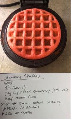 a waffle is sitting on the counter next to a note that says, strawberry chilli