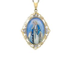 A beautiful and timeless statement of faith, this Virgin Mary pendant is crafted in Sterling Silver and 18 karat gold plating. The filigree oval frame, adorned with 12 crystals, takes this piece to the next level of elegance. The Hail Mary prayer is inscribed on the back of the pendant. The pendant hangs on an 18-inch rope chain with spring ring clasp. Color: Blue. Gender: female. Age Group: adult. Elegant Miraculous Medal Jewelry For Gift, Elegant Miraculous Medal Jewelry Gift, Elegant Miraculous Medal Necklace, Yellow Gold Miraculous Medal Necklace As Gift, Elegant Miraculous Medal Round Pendant Jewelry, Elegant Round Miraculous Medal Jewelry, Elegant Miraculous Medal Jewelry, Elegant Pendant Necklace With Miraculous Medal, Elegant Miraculous Medal Pendant Necklace