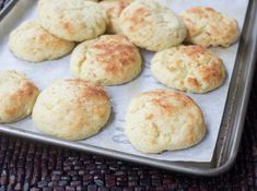 freshly baked biscuits on a baking sheet ready to go into the oven or bake