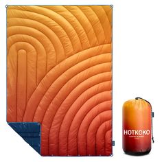 an orange and red sleeping bag next to it's side with the words hotkoo printed on it