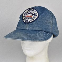 For sale is a Vintage Union Workman Chewing Tobacco Blue Denim Snapback Hat Cap. MADE IN USA! Pre-owned condition. Shows some signs of wear from age and use. No tears or damage. Has some stains on the inner band and on the bill. I had to vacuum the foam lining out because it had deteriorated. There is some still residing under the inner mesh that wouldn't release. Please see photos for more details.  Photos are part of the description.  I make all efforts to list any defects or damage in my list Vintage Pre-washed Dad Cap, Vintage Pre-washed Dad Hat, Vintage Adjustable Six-panel Dad Hat, Faded Vintage Hat, Vintage Cotton Trucker Hat With Curved Bill, Vintage Dad Hat With Curved Bill, Vintage Hats With Curved Brim In Medium Wash, Vintage Blue Dad Hat, Vintage Adjustable Hat In Faded Color