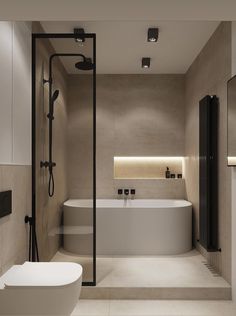 a bathroom with a bathtub, toilet and sink in it's center area