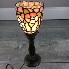 a lamp that is sitting on the floor