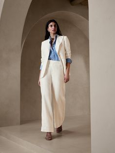 Luxurious linen - with its incredible ability to maintain a cool, crisp composure - comes to life in this beautiful high-rise pant with a tuxedo stripe and polished pressed crease.  WIDE-LEG FIT: High-rise (9").  Straight through the hip and thigh wi Classic Linen Pantsuit For Formal Occasions, Elegant Linen Pantsuit For Formal Occasions, Elegant Linen Pantsuit For Formal Events, Tailored Linen Classic Pantsuit, Classic Spring Linen Pantsuit, Classic Linen Pantsuit For Spring, Tailored Linen Pantsuit For Formal Occasions, Elegant Tailored Linen Pantsuit, Chic Linen Pantsuit With Notch Lapel