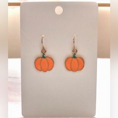 Don’t Miss Out On These Super Cute Earrings! Great For The Fall Season, From Halloween, To Thanksgiving. The Hooks Are Made Out Of Gold-Plated Stainless Steel So I Believe They Should Be Hypoallergenic. They Are Not Claire’s Brand, Just Tagged Them Under That So They Could Be Seen By Shoppers. Product Description: - Enamel/Metal Pumpkin Pendant - “Fish Hook” Style Earring With Rubber Backing - Lightweight - Brand New / Never Worn - The Pumpkin Itself Is Very Cute And Small, Only About Half An In Cute Orange Earrings For Halloween, Cute Orange Halloween Earrings, Trendy Jewelry As Fall Season Gift, Trendy Fall Jewelry Gift, Cute Nickel-free Orange Earrings, Cute Orange Nickel-free Earrings, Pumpkin Accessories, Gilmore Girls Seasons, Metal Pumpkins