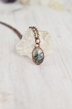 Handmade with raw materials and intention, this green moss agate necklace awakens the wild woman. Created with natural stones, each one organically different and individually unique just like you. Embedded in electroformed copper, inspiring a textured, earthy style. The moss agate pendant invites you to embrace your intuitive nature. Explore the forests, climb the mountains, and swim in the rivers. "Letting go is where life begins." Trust your instincts and walk into the wild. Crystal properties Moss Agate Necklace, Earthy Necklace, Stone Jewelry Necklace, Moss Agate Jewelry, Raw Stone Jewelry, Raw Gemstone Jewelry, Natural Gemstone Necklace, Green Moss Agate, Magical Jewelry