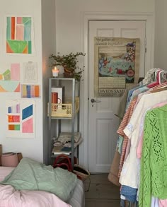 a room filled with lots of clothes and blankets