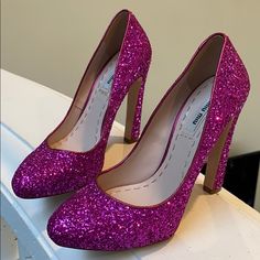 Miu Miu Size 36 1/2 Glitter Pumps With 4 1/2 Heel. Never Worn Outside. Luxury Round Toe Heels For Prom, Luxury Glitter Heels With Round Toe, Pink Glitter Heels For Formal Occasions, Formal Pink Glitter Heels, Pink Sequined Round Toe Heels, Glitter Heels With Almond Toe, Glamorous Heels With Glitter Print And Round Toe, Glamorous Glitter Print Heels With Round Toe, Glamorous Heels With Glitter Print