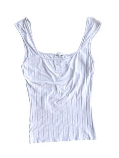 A soft white top with ribbing from Mugler. A staple in everyone's wardrobe, a classic fit with slightly shaped shoulder straps for a interesting and flattering design. Condition: in great vintage condition Material: polyamide and elastane  Size: no size tag, estimated to a M/L Important Information: All orders are shipped within 2-8 business days of purchase with Tracking. A notification email will be sent with tracking when the order has shipped. Once an item has been shipped, Juno Juno is not Ribbed Top, Designer Vintage, Juno, Soft White, White Top, White Tops, Vintage Designs, Jumpsuit Dress, Shoulder Straps