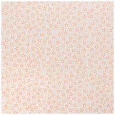 an orange and white area rug with small dots on the bottom, in front of a white background