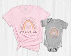 Mama Mini Rainbow Matching Shirt, Mommy and Me Shirts, Mommy Daughter Shirts Set, New Mom Gift , Mama mini rainbow t-shirt Please note this disclaimer: This item is not affiliated with any existing intellectual property or trademark unless specified in the Product Description. This item is a fun shirt for fans. - Price advertised is only for *ONE* T-shirt. Please add multiple shirts to cart to make a set. - Child Design is available in Bodysuit and T-Shirt (See Dropdown Menu for options) -Our sh Fun Rainbow Print Short Sleeve Top, Playful Rainbow Print Top, Playful Pink Tops With Rainbow Print, Playful Multicolor Rainbow Print T-shirt, Playful Crew Neck Top With Rainbow Print, Playful Rainbow Print Crew Neck Top, Cute Multicolor T-shirt With Rainbow Print, Cute Multicolor Rainbow Print T-shirt, Playful Short Sleeve Rainbow Print Tops