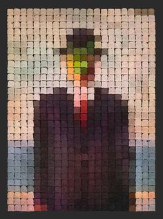 an image of a man made out of small squares in different colors and sizes,