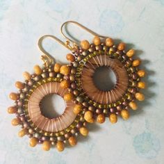 Golden Mother of Pearl Shell Dangle Earrings | Etsy Bohemian Brown Beaded Round Earrings, Artisan Brown Beaded Earrings For Pierced Ears, Brown Beaded Hoop Earrings As Gift, Brown Beaded Hoop Earrings For Gift, Bohemian Gold Beaded Circle Earrings, Handmade Brown Dangle Hoop Earrings, Brown Beaded Bohemian Hoop Earrings, Handmade Beige Round Earrings, Bohemian Brown Beaded Hoop Earrings