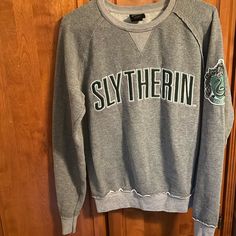 Universal Studios, Harry Potter Slytherin, Gray Sweatshirt Size Small , Never Worn To Small For My Son Universal Studios Sweatshirt, Harry Potter Merchandise Clothes, Hogwarts Sweatshirt, Harry Potter Sweat Shirt, Harry Potter Universal Studios, Harry Potter T-shirts & Tank Tops, Walker Boots, Grey Sweatshirt, Fit N Flare Dress