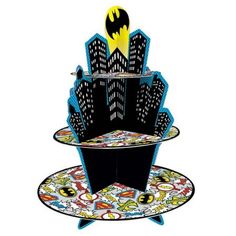 a batman themed cake stand with two tiers