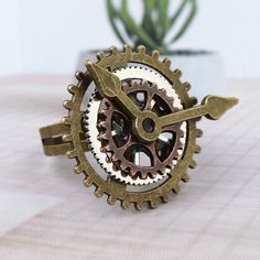 ADOPT A NEW STYLE WITH THIS CLOCK RING, REPRESENTING A FANTASY AND STEAMPUNK world. Original Steampun design One size fits all (adjustable) Composition: metal and zinc alloy Clock Ring, Steampunk Outfits Women, Steampunk Table, Ring Clock, Book Space, Moda Steampunk, Corset Steampunk, Steampunk Items, Mode Steampunk