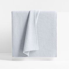 two folded white towels on top of each other