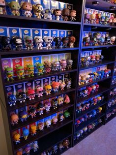 the shelves are filled with many different kinds of pop vinyls and action figure toys