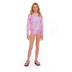 Get ready to make a splash in style with our vibrant Pink Tie Dye Rashguard for girls! This must-have swimwear piece features a trendy tie dye design that will make your little one stand out at the pool or beach. Made with high-quality fabric, it offers both comfort and sun protection, perfect for all-day play. Don't miss out on this fun and fashionable addition to your child's summer wardrobe! Printed Rash Guard For Swimming In Spring, Playful Fitted Swimwear With Uv Protection, Spring Beachwear Rash Guard For Pool, Spring Stretch Rash Guard For Pool, Uv Protection Swimwear For Spring Playwear, Spring Poolside Rash Guard With Uv Protection, Spring Rash Guard With Uv Protection For Poolside, Playful Fitted Swimwear For Playwear, Casual Rash Guard For Spring Swimming