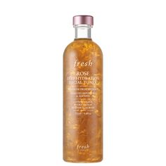 A daily, non-stripping toner with real rose petals and hyaluronic acid that minimizes pores while increasing hydration by 46% for 6 hours This best-selling, alcohol-free formula has an unmatched amount of rose power: toning rose fruit extract, soothing rosewater, nourishing rose oil, and real floating rose petals. It hydrates and clears skin of leftover impurities, leaving it silky soft and prepped for the products you apply after. Rose Toner, Best Toner, Real Rose Petals, Skin Care Toner Products, Toner For Face, Rose Oil, Facial Toner, Dehydrated Skin, Rose Water