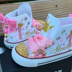 Just as shown but with your little girl's name and age. Gold crystals on the toes and pink and gold crystals and pearls on the sides and back along with pink bows on the backs of the shoes. Her name will be in gold script font. I have also made these in mauve/gold/pink and lavender/gold/pink. I can customize these with any colors you'd like. Please leave your colors in the notes to seller box when you check out if you'd like anything other than gold/pink. Custom Baby Shoes, Bedazzled Shoes Diy, Converse Gold, Pageant Shoes, Bedazzled Shoes, Bling Converse, Idee Cricut, Glitter Crown