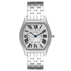 Cartier Tortue 18k White Gold Silver Dial Ladies Watch 3701 Box Papers. Manual winding movement. 18K white gold case 31.0 x 39.0 mm. Octagonal crown set with the blue cabochon. 18K white gold bezel. Scratch resistant sapphire crystal. Silver sunray silver dial with roman numerals. Blue sword shape hands. Secret signature at VII. 18k white gold bracelet with double deployant buckle.  Fits 7 1/4" wrist. Classic Cartier Watch With Metal Dial, Classic Cartier Chronometer Watch, Classic Cartier Rectangular Watches, Cartier White Watch With Metal Dial, White Cartier Watch With Metal Dial, Cartier White Gold Chronometer Watch, Cartier White Gold Watch With Chronometer, Timeless Cartier Platinum Watch, Elegant White Cartier Watch Accessories