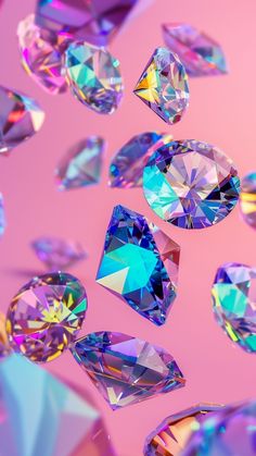 many different colored diamonds on a pink background