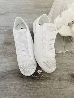 Stunning custom made wedding converse. Customised with crystals, pearls, any colour ribbon laces to match your colour scheme Also come with original laces Any personalisation - no extra charge Other colours available please just ask All adults sizes available Please add personalising and colour information in the personalisation or message to seller box at checkout If you have any specific requirements please let me know and they can be made for you!  Returns not accepted as these are made to or Custom White Converse, Bride Sneakers Wedding, Converse Bride, Wedding Trainers, Bride Converse, Bride Sneakers, Bling Converse, Wedding Converse